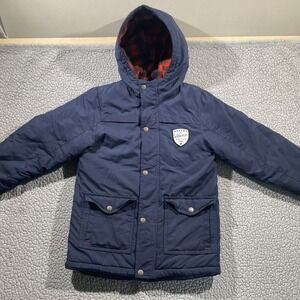 Carter's "Expert Wilderness Rescue Patrol" navy blue jacket with a red plaid